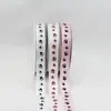 1. 15mmx15m Paw Print Grosgrain Ribbon Black on White thumbnail