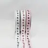 1. 15mmx15m Paw Print Grosgrain Ribbon Black on Pink thumbnail