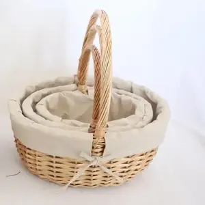 SET OF 3 OVAL HONEY WILLOW BASKETS WITH NATURAL LINER 42x35x18cmh